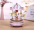 Close-up detail of a pink carousel music box with white hearts and gold accents - Pink and White Style (3#) / Height 18cm Diameter 11cm