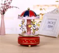 Vintage-style red and pink wind-up carousel music box with rotating white horses - Red and Blue Style (1#) / Height 18cm Diameter 11cm