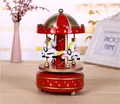 Close-up detail of a classic red and gold carousel music box featuring white horses. - Red and Gold Style (6#) / Height 18cm Diameter 11cm