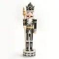 Full-length detail of a 38cm wooden nutcracker soldier with silver and black uniform - 38cm / Silver
