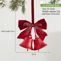 Red metal Christmas bells hanging with velvet bow and measurement markings for holiday decor - Red Bell / LD-034