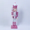 Dettaglio di un soldato schiaccianoci di Natale rosa glitterato alto 30 cm - Stile Re Con Scettro / 30cm