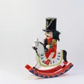 Detailed view of 30cm wooden nutcracker soldier on a white rocking horse figurine - Soldier / 30*25cm