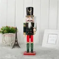 Schiaccianoci tradizionale da 30 cm in legno con uniforme in tessuto verde e spada - 30cm / Spada Verde