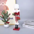 Detailed shot of wooden female nutcracker soldier figurine with white fur hat - Gift Style (SB58575)