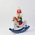 Detail of a 30cm wooden nutcracker soldier riding a white rocking horse figurine - Santa Claus / 30*25cm