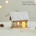 Handcrafted glowing wooden Christmas cabin decoration with artificial snow-covered roof - Christmas Cabin Style (B8570) / 10x9.5x8.5cm