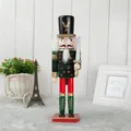 Klassieke houten notenkraker soldaat van 30 cm met groene jas, rode broek en een zwaard - Soldier With Sword In Green / 30cm