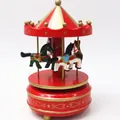 Detailed close-up view of a classic red and gold carousel music box with painted horses - Style No. 4 (Red and Gold) / 20x10.5x6cm