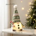Glowing Christmas gnome decoration with green knit hat and warm lights - Candy Cane Style / Light-up Doll Ornament