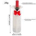 Festive white knitted Christmas wine bottle cover with red bow detail, stretchable craft - Bowknot Style / 1 Piece / White