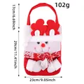 Festliche gestrickte Weihnachts-Geschenktüte mit süßer Schneemann-Figur und Schal - Hirsch