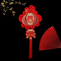 Detailed view of red Chinese knot ornament with gold Fu character and koi fish embroidery. - BB1-32 Lucky Bag With Fish Style (BB1-32)