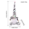 Seated zebra print gnome plush doll ornament with white beard and size dimensions - Sitting Faceless Doll / Zebra Print