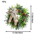 Rustikaler Weihnachtskranz mit Zapfen, goldenen Glocken, Eukalyptus und Leinenschleife - Glockenkranz (H2-21)