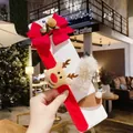 Kerst haarclip set met rode strik en een pluche rendier op een displaykaart - Kerst Eland Set (T1-22)