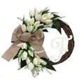 Close-up of artificial white tulip wreath with burlap bow and letter F decoration - Letter F