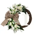 Close-up of decorative grapevine wreath with white tulips and wooden letter I accent - Letter I
