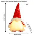Handmade Christmas gnome plush with red sequin hat and warm glowing LED beard ornament - Red