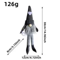 Grey knitted faceless gnome doll with dangling legs and heart hat for Christmas decoration. - F1-2 Black Braid Style