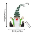 Handcrafted wooden Christmas gnome figurine measuring 13x8x2cm with a weight of 67g - Green