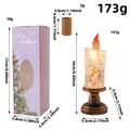 Christmas LED snow globe candle lamp with dimensions and purple gift box packaging - Angel Style