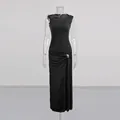 Full length view of a slim black dress with side pleats and a metal buckle detail. - S / Dresses / Black