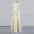 Detailed view of an elegant white high-neck sleeveless maxi dress with floral appliques - S / Dresses / Apricot