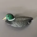 Detailed side view of a realistic plastic mallard duck decoy for garden pond decor. - Small Male Mandarin Duck