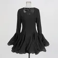 Elegant gothic black mini dress with square neck and flared ruffled sleeves on mannequin - S / Tops / Black