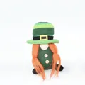 Detailed view of St. Patrick's Day gnome plush with green hat and long orange braids - Female Style (With Braids) / Green/Orange