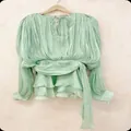 Mint green pleated long sleeve dress with waist tie and layered ruffle hemline - Green