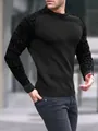 Schwarzes Waffelstrick-Herren-Langarmshirt mit geometrischen Mustern an den Ärmeln im Detail - S / Oberteile / Schwarz
