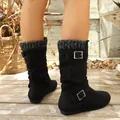 Black suede mid-calf slouchy boots with grey knit cuff and silver buckle details. - 36 / Black