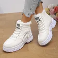 Detail shot of white high-top women's winter boots with faux fur lining and side zipper. - 36 / White