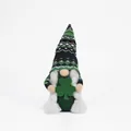 Detail view of St. Patrick's Day gnome doll holding a green Lucky Irish shamrock - Grey Beard Style (B)
