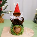 Detail of a Santa-themed Christmas gift bag with a heart-shaped window for apples. - Heart Santa Style