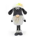 Detail view of a handmade Easter gnome plush sheep with long legs and spring flowers - Black