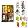 Set decorativo di Pasqua con coniglietti pulcini uova colorate e carote con dimensioni - Set