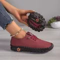 Flexibele bordeauxrode zachte lederen instappers met rubberen zool, gevouwen getoond - 35 / Bordeauxrood