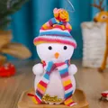 Christmas snowman gift bag featuring a colorful striped knitted hat and scarf decoration - Colorful Striped Hat Snowman