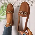 Detailed close-up of brown faux leather loafers featuring a gold-tone rhinestone chain. - 36 / Rhinestone Chain Style / Brown