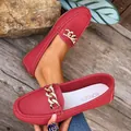 Detailed view of red leather loafers with elegant gold chain buckle and textured finish - 36 / Rhinestone Chain Style / Red