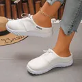 Detail of white suede-like casual slip-on loafers for women featuring textured white soles - 36 / White
