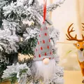 Nordic Christmas gnome ornament with grey knitted hat and red hearts hanging on tree - Style C