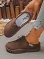 Macro detail showing the texture of brown suede wedge clogs with adjustable drawstring. - 36 / Tan