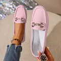 Detail view of pink leather loafers featuring a sparkling metal buckle design - 36 / Rhinestone Butterfly / Pink