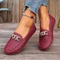 Close-up of stylish wine red leather loafers featuring gold chain rhinestone buckle - 36 / Rhinestone Chain Style / Dark Red