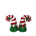 Close-up of two red and white striped spiral Christmas hats with green glitter base decoration - Red and White Spiral Style / 2 Pcs/Set