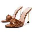 Brown crocodile-embossed high-heeled mules with gold-toned stiletto heels for banquet. - Coffee